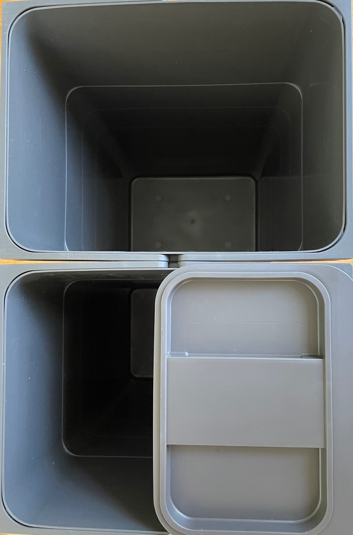 the food caddy nestles in top of one of the 32l buckets for storage