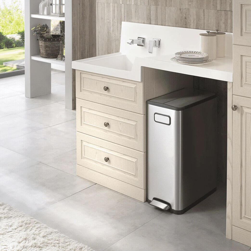 stainless steel waste bin under worktop