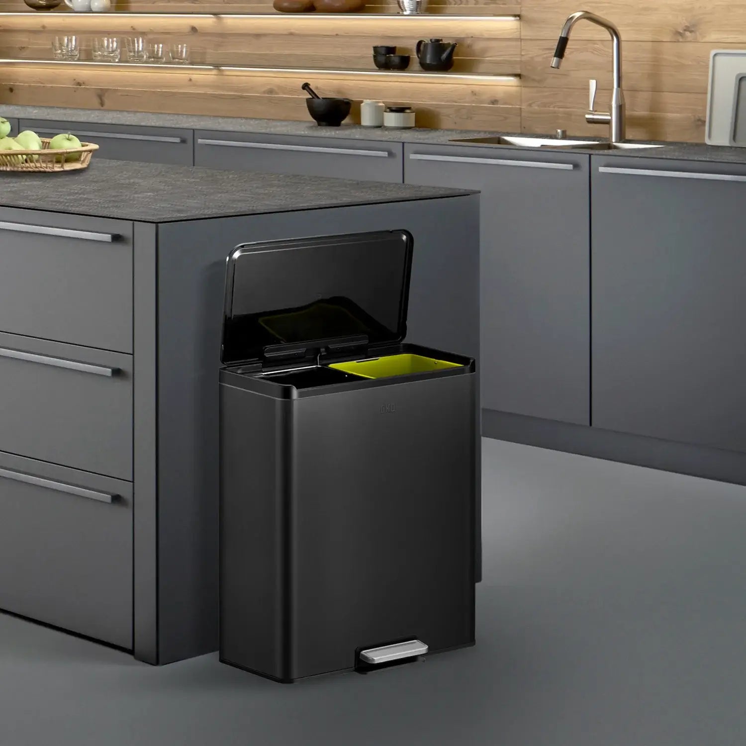 Matt black waste bin with open lid in a modern kitchen setting