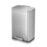 Stainless steel waste bin on a white background