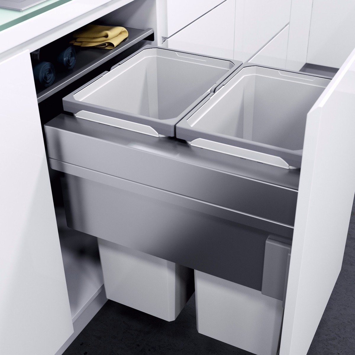 A well-designed integrated kitchen cabinet bin from Vauth-Sagel with two compartments,in a light silver grey colourway.