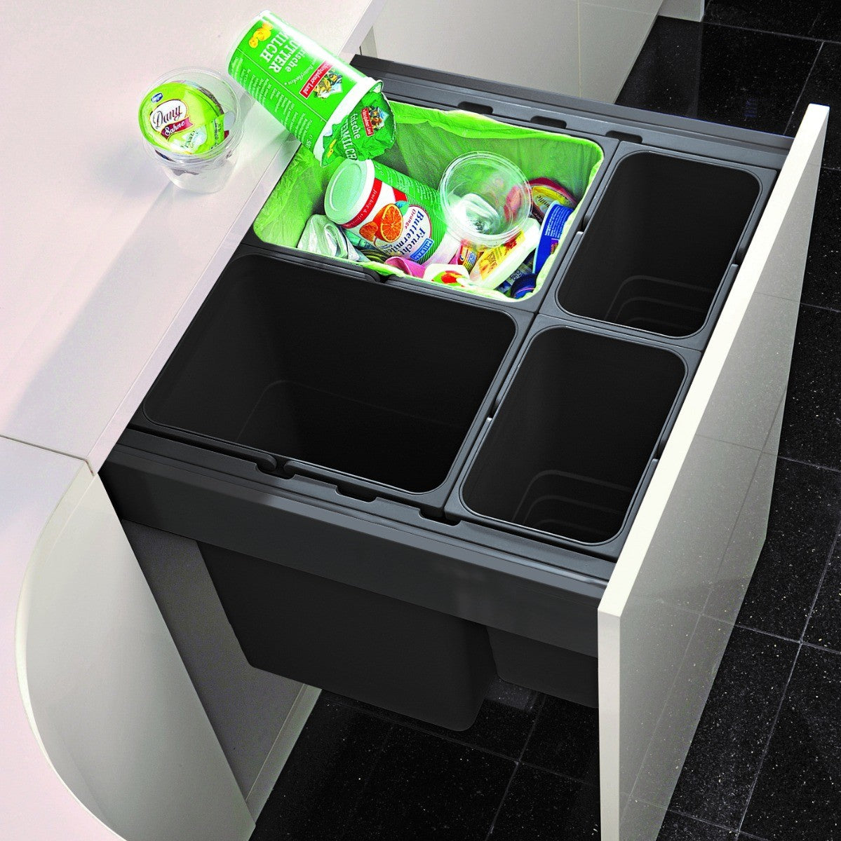Ninka One2Five Four Compartment 80L integrated recycling bin, designed for easy waste and recycling separation in 600mm wide kitchen cabinets with pull-out doors.