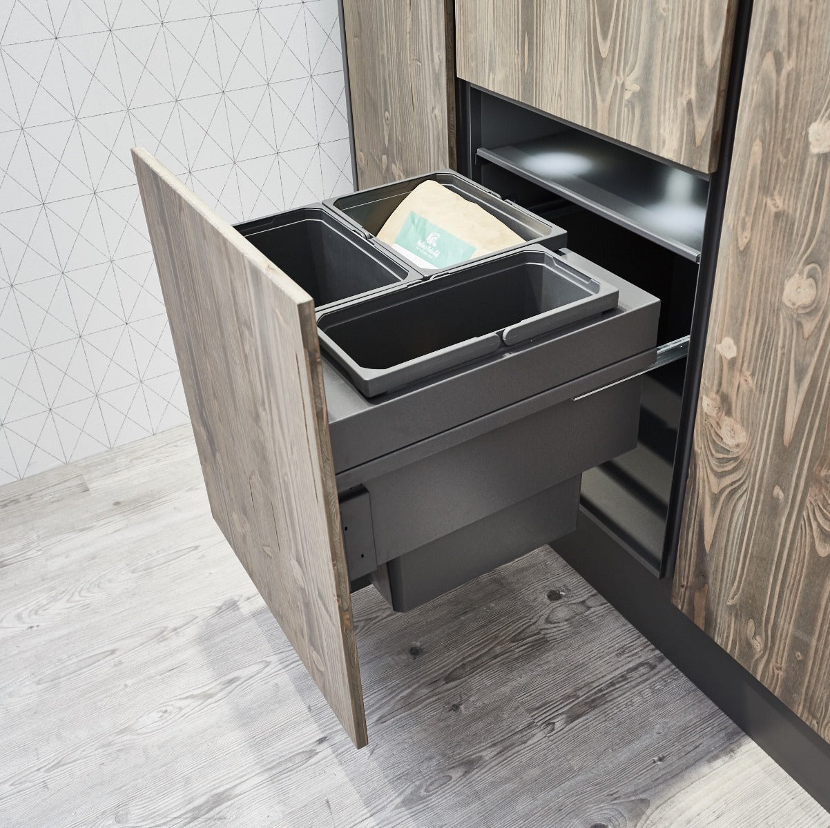 Vauth-Sagel pull-out integrated kitchen bin in lava grey with three compartments, ideal for separating waste and recycling