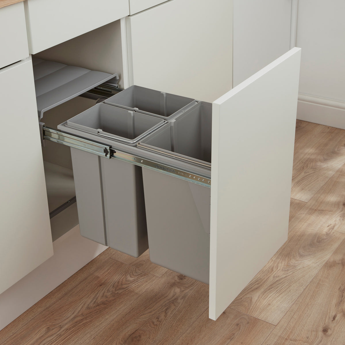 Wesco Bio Trio for 400mm cabinets with 3 compartments. Attaches to the cabinet door and has 3 light grey inner bins