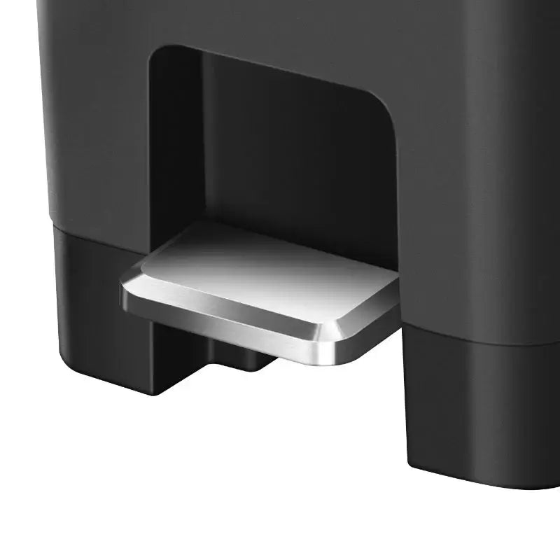 Black pedal bin on a white background